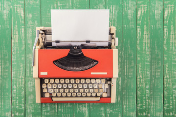 The typewriter on the green table