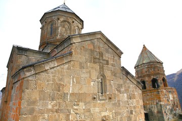 Fototapeta na wymiar Gergeti trinity church at an elevation of 2170 meters, under Mount Kazbegi in Georgia