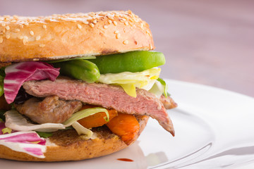 Duck meat bagel.