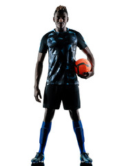Naklejka premium one african soccer player man playing in studio isolated on white background
