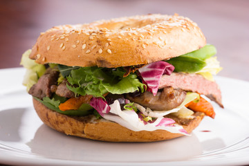 Duck meat bagel.