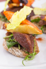 Roasted beef chick on a toast.