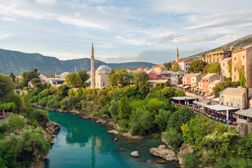 Fototapeta na wymiar Mostar mosque with river in old town. Bosnia and Herzegovina