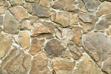 Texture of a stone wall. Can be used as a background for a typography design or texture in computer graphics and game development.