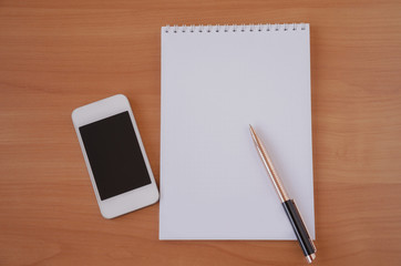 notepad with pen for notes