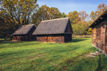 Plakat Traditional wooden farm buildings in heritage park of Kampinos Forest in Poland
