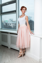 Portrait of redhead modern ballerina © Andrii