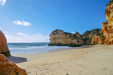 Landscape of the rocks, cliffs and ocean beach coastline Algarve Portugal, Europe. Sunny day, 2018. Panoramic nature beauty seascape, sunshine view