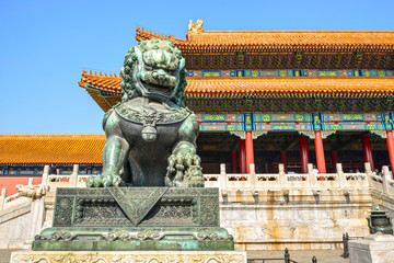 Chinese guardian lion. People are visiting. Located in The Palace Museum (Forbidden City), Beijing, China.	