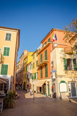 Fototapeta na wymiar Narrow streets and traditional buildings of Celle Ligure, Liguria, Italy