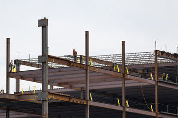 Steel construction with a working crane