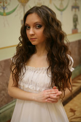 beautiful young victorian lady in white dress