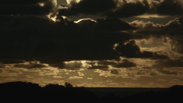 Sunset through clouds