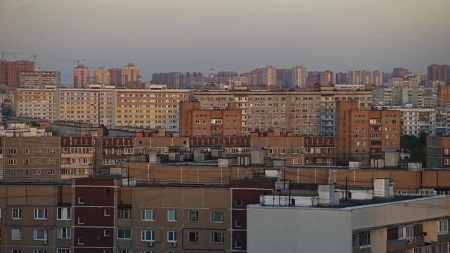 Dense URBAN DISTRICT with panel APARTMENT BUILDINGS in a typical Eastern European city, filmed during daylight