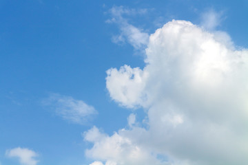 Blue sky with the big white cloud