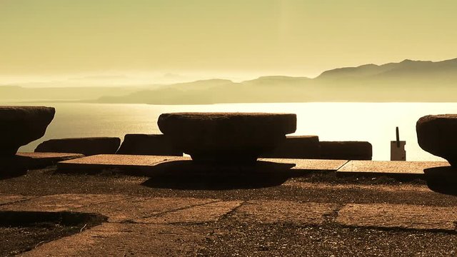 Assos, ancient ruins on the sea and islands background, sepia vintage,  Behramkale, Turkey