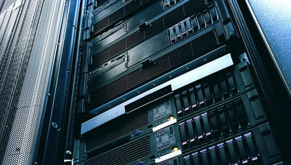 Server technology in datacenter from bottom view with depth of field