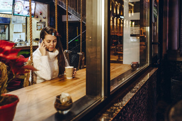 woman drink warm up tea in cafe