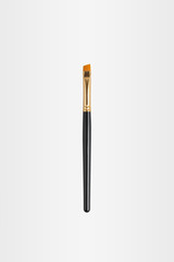 set of brow brushes, on a neutral background.