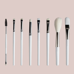 set of brow brushes, on a neutral background.