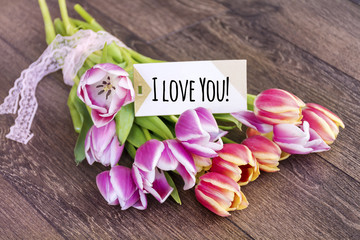 beautiful tulips with i love you message card 