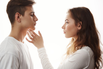 Concept of love and care. They are so young but already overcome a lot together. There will be a lot of problems during life, but couple will support each other and cover each others back.