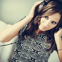 woman in headphones listening music mp3 relaxing