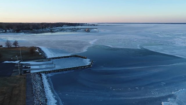 Aerial View Of The Frozen Choptank River Lighthouse And Marina Cambridge Maryland