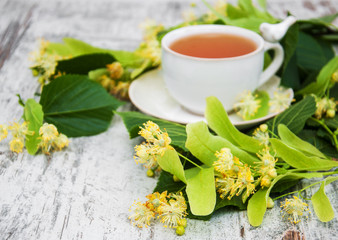 cup of herbal tea with linden flowers