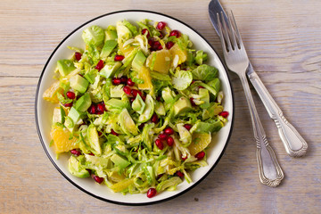 Refreshing Brussels Sprouts Pomegranate, Avocado, and Orange Salad