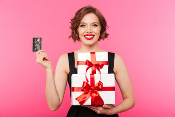 Fototapeta premium Portrait of a smiling girl dressed in black dress