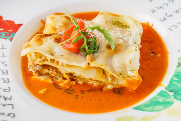 tasty lasagna with sauce