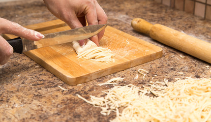 Preparation of home-made noodles in the kitchen
