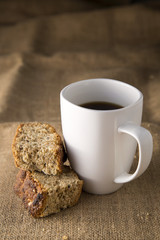 cup of coffee with rusks 