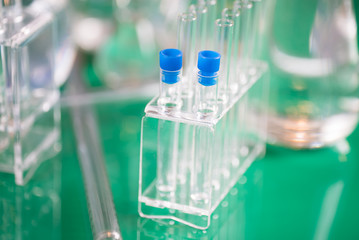 Science laboratory research and development concept. microscope with test tubes