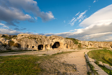 Fototapeta na wymiar Artificial Caves - Ancient Amphitheater Syracuse Italy
