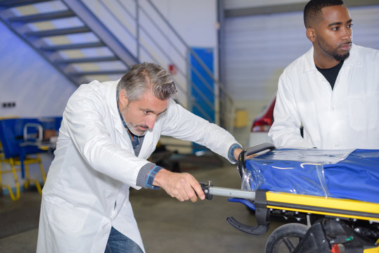 Man Pushing Stretcher