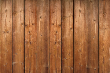 Obraz premium Brown wood texture. Abstract background, empty template. rustic weathered barn wood background with knots and nail holes. Close up of wall made of wooden planks.