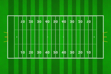 Top views of american football field. Green grass pattern for sport background. Ragby football field with white lines marking the pitch.
