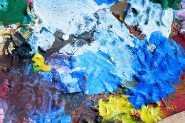 Artist's palette with different colors. Wood. A variety of colors. Texture