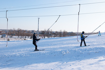 skiers on the mountain