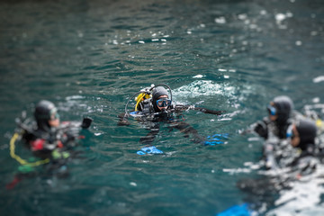 Cheerful diver in water