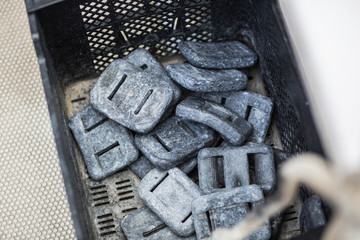 Lead scuba weights on a boat.