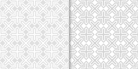 Light gray geometric ornaments. Set of seamless patterns
