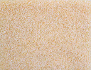 Fototapeta na wymiar Texture background. Dry small gelatin granules or powder.