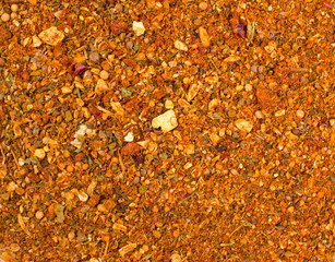 Texture background. Yellow spice mix for meat  . Spices consist paprika onion garlic coriander turmeric black pepper basil dill