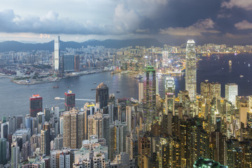 Fototapeta na wymiar Victoria harbor of Hong Kong City, from day to night