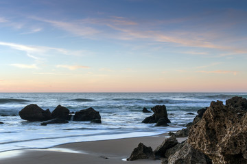 Fototapeta na wymiar Puesta de sol en las playas de Cadiz