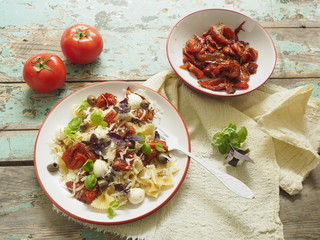 Pasta salad with roasted tomatoes and green olives