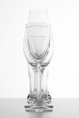 Empty glasses of champagne, red wine and beer on white background
